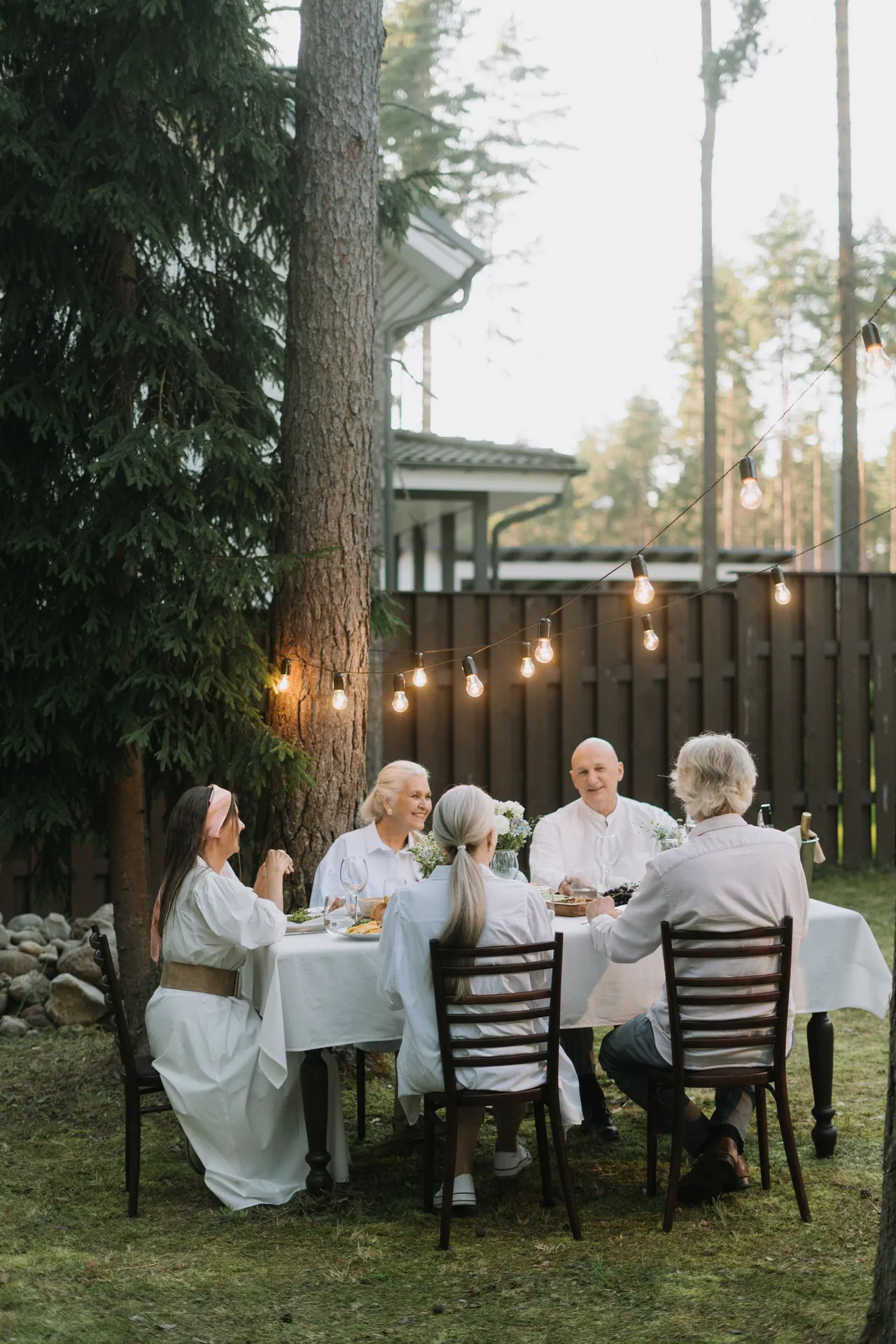 A group dining outdoors in daylight